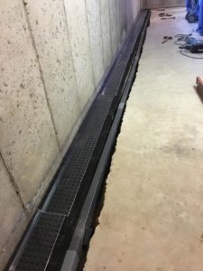 Basement waterproofing system installation
